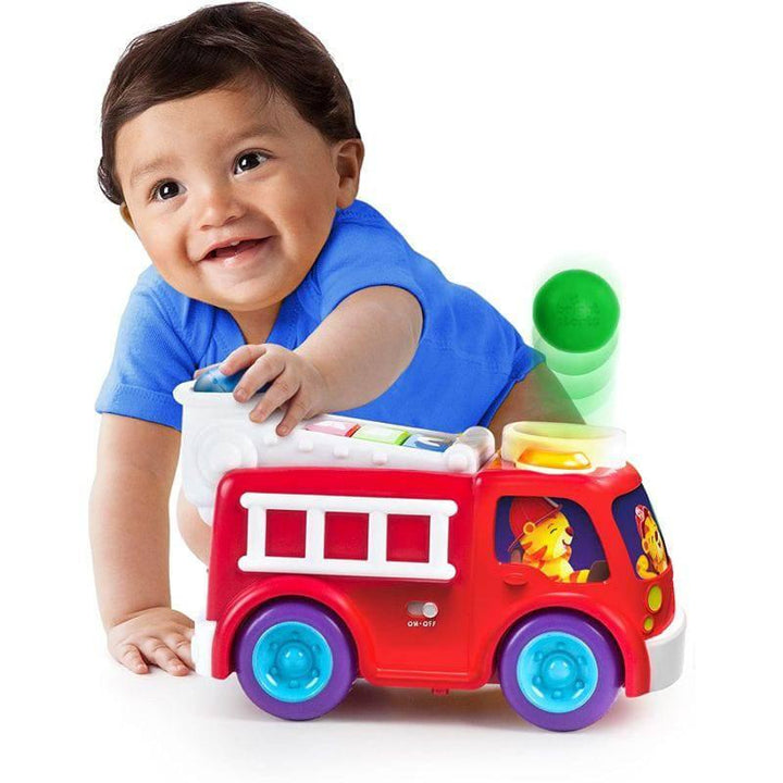 BRIGHT STARTS Roll & Pop Fire Truck Toy - multicolor - ZRAFH