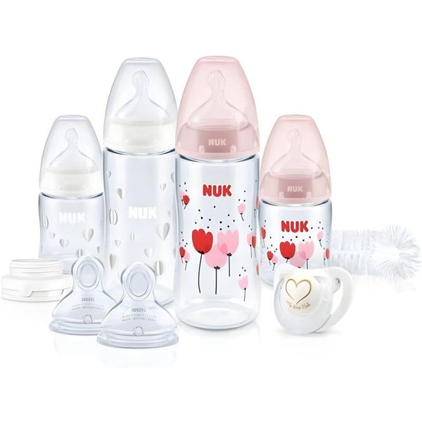 Nuk 4 Piece Baby Bottle Set With Cleaning Brush And Pacifier For Girls - Pink - Zrafh.com - Your Destination for Baby & Mother Needs in Saudi Arabia